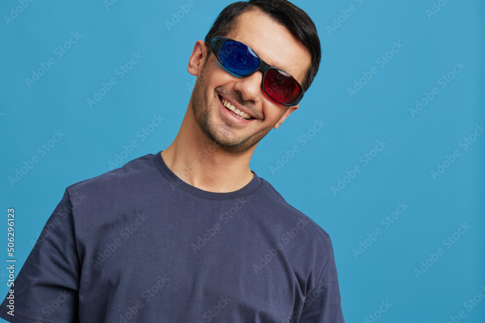 man 3D glasses cinema fun emotions blue background man 3D glasses cinema fun emotions blue background