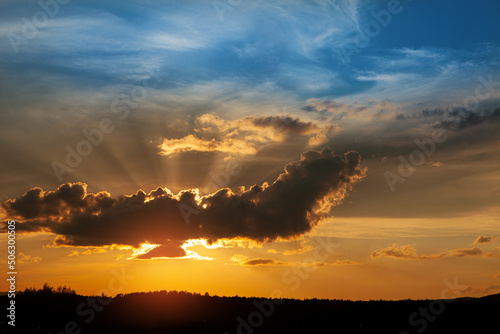 Gorgeous panorama scenic of the strong sunrise with cloud on the orange sky. © hamara