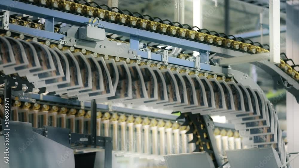 Industrial equipment with a conveyor belt for typography. Technological production with quality control at the printing house. High quality FullHD footage Industrial equipment with a conveyor belt for typography. Technological production with quality control at the printing house. High quality FullHD footage