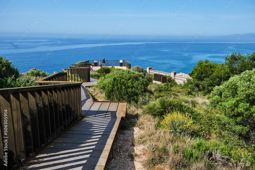 Viewpoints and walkways to look at the sea from the top of a balcony, on a sunny summer day.