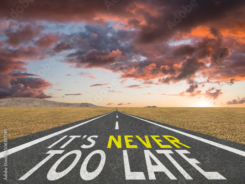 It's Never too Late motivational quote on highway.