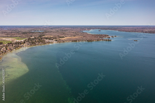 Cumberland beach  amigo beach  water drone view islands  in Ontario Canada  summer time blue skies  © contentzilla