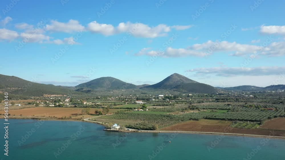 The mountains around Kilada in Europe, Greece, Peloponnese, Argolis, in summer on a sunny day. The mountains around Kilada in Europe, Greece, Peloponnese, Argolis, in summer on a sunny day.