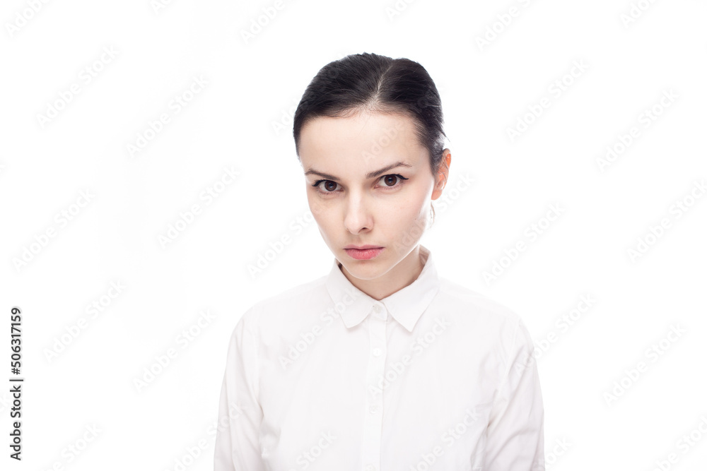 serious woman in white shirt on white background serious woman in white shirt on white background