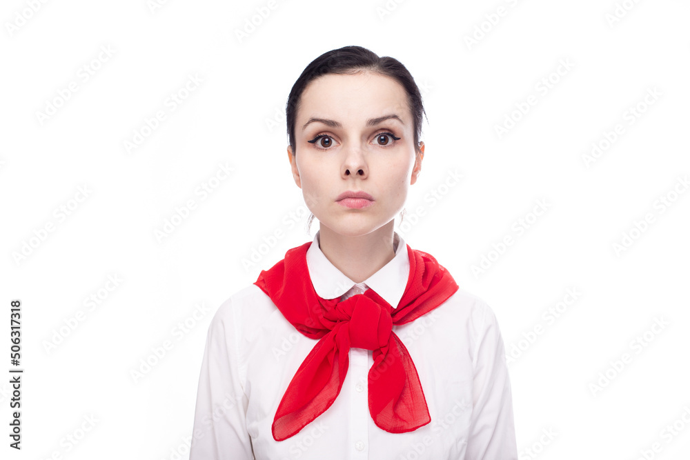 sad woman in a white shirt and a red scarf around her neck
