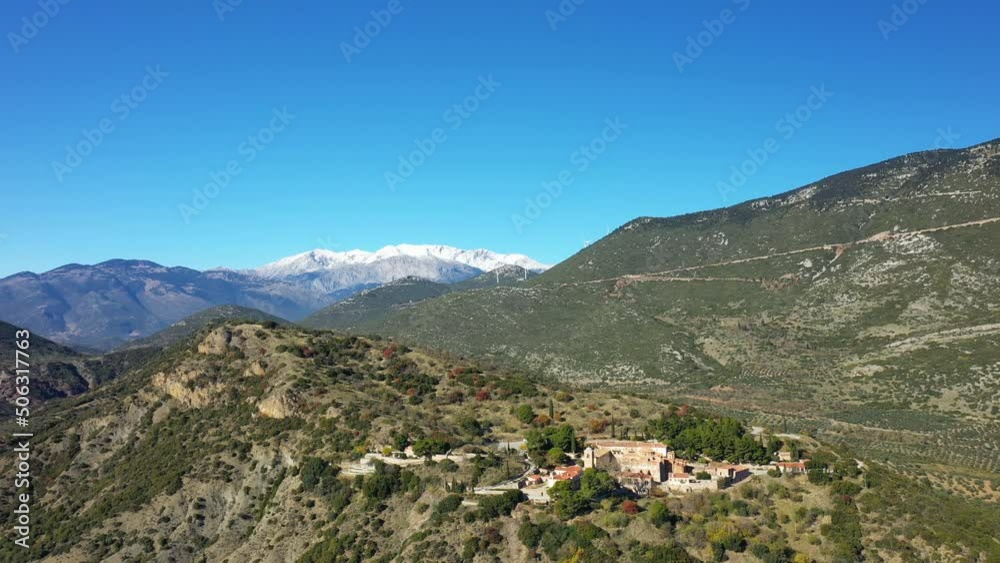 Mount Parnassus behind the Hosios Loukas Monastery in Europe, central Greece, towards Delphi, in summer, on a sunny day. Mount Parnassus behind the Hosios Loukas Monastery in Europe, central Greece, towards Delphi, in summer, on a sunny day.