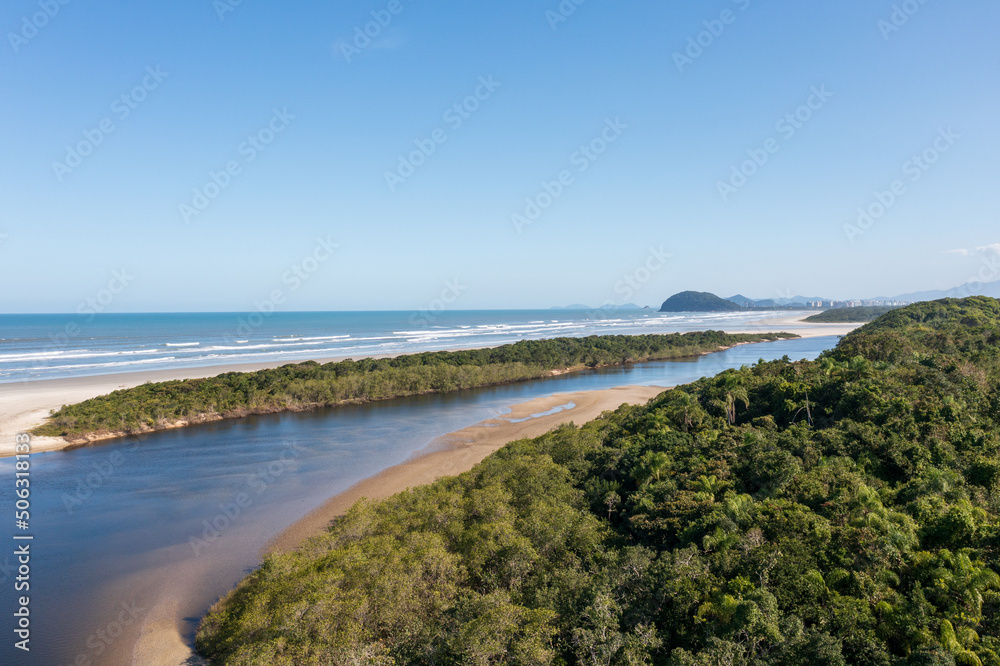 Aerial image of the meeting between Rio and the Sea. Environmental reserve, beautiful and empty beach Aerial image of the meeting between Rio and the Sea. Environmental reserve, beautiful and empty beach