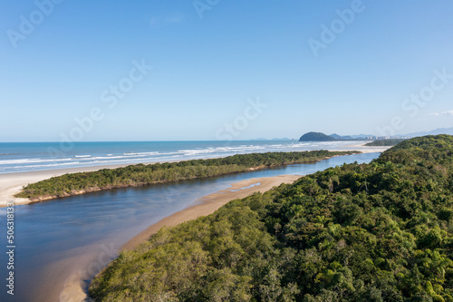 Aerial image of the meeting between Rio and the Sea. Environmental reserve, beautiful and empty beach