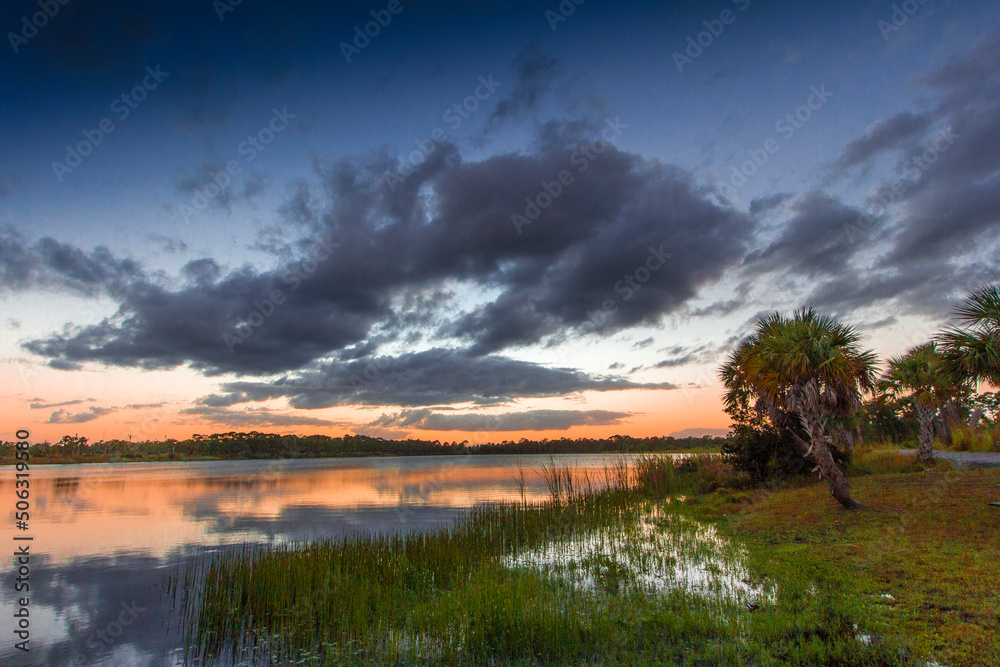 Fototapeta premium Colorful Sunset over Lake Zobel, George LeStrange Preserve, Fort Pierce, Florida