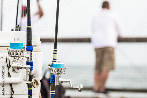 Fishing rods on Pier at Navarre Beach, Florida