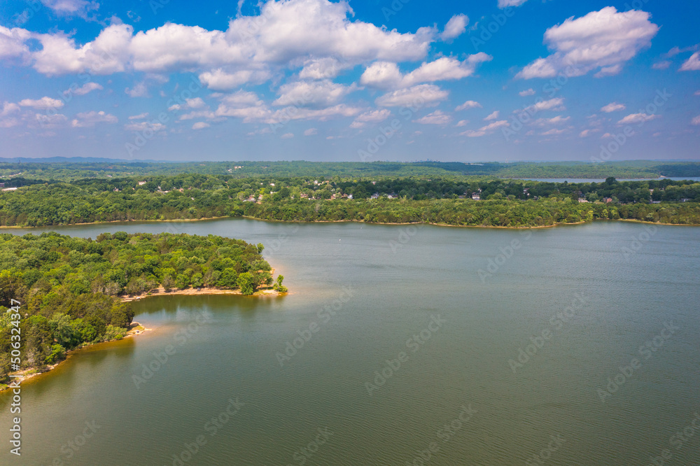 Tennessee Lake Near Nashville. Tennessee is a landlocked state in the U.S. South. Its capital, centrally located Nashville, is the heart of the country-music scene, with the long-running Grand Ole Opr