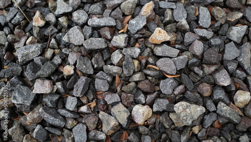 pile of pebbles rock used as garden decoration