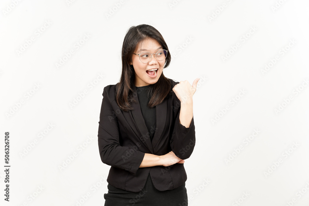 Presenting and Pointing Side Product Using Thumb Of Beautiful Asian Woman Wearing Black Blazer Presenting and Pointing Side Product Using Thumb Of Beautiful Asian Woman Wearing Black Blazer