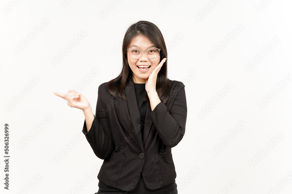 Showing Product and Pointing Side Of Beautiful Asian Woman Wearing Black Blazer Isolated On White Showing Product and Pointing Side Of Beautiful Asian Woman Wearing Black Blazer Isolated On White