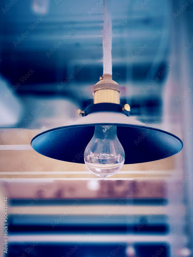 Light from the lamp In the dim atmosphere.