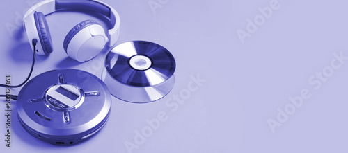 Tableau sur toile Personal compact portable CD player disks headphones blue very peru neon backgro