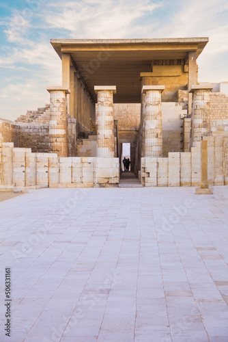 The western entrance to the pillared hall of the mortuary temple with stone columns in the form of tree trunks from the side of heb-sed square, the Pyramid of Djoser