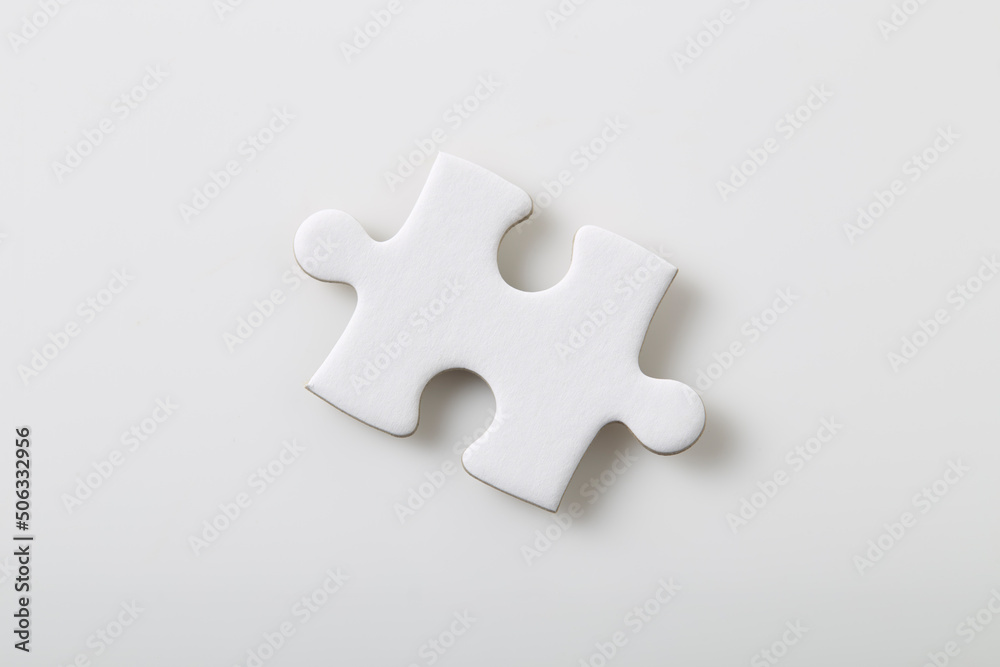 Fototapeta premium Blank jigsaw puzzles piece isolated on white