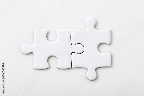 Blank puzzle pieces on a white background