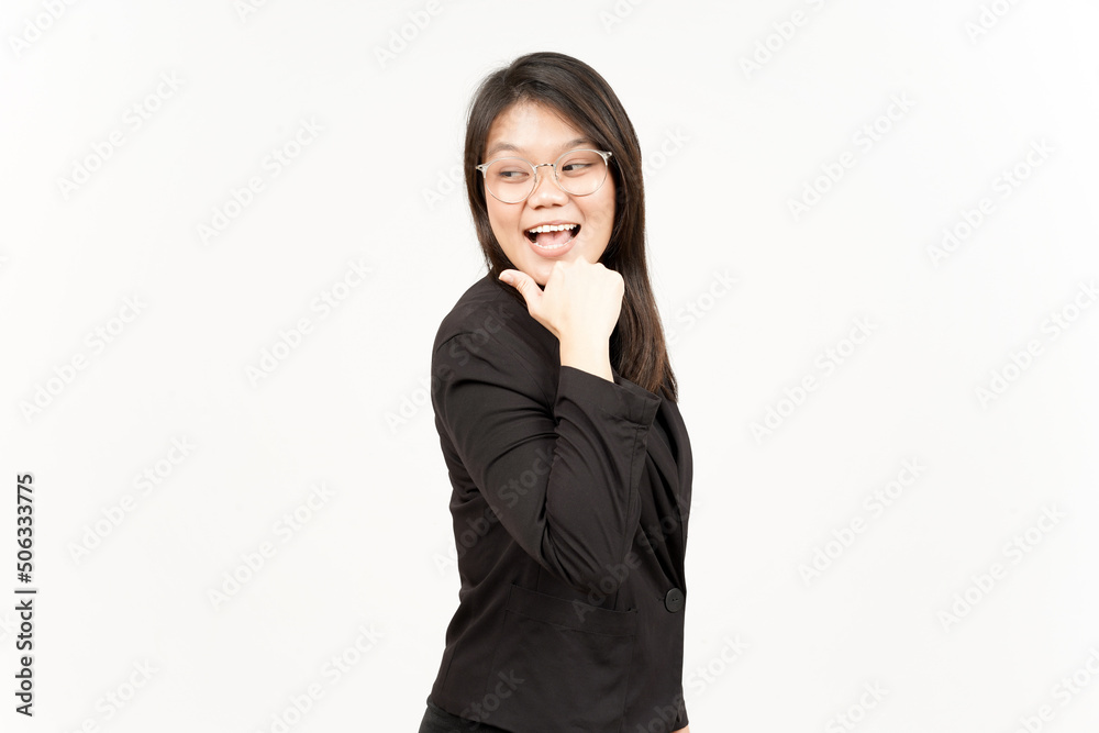 Presenting and Pointing Side Product Using Thumb Of Beautiful Asian Woman Wearing Black Blazer Presenting and Pointing Side Product Using Thumb Of Beautiful Asian Woman Wearing Black Blazer
