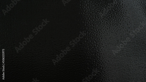Abstract Black Fabric Background With Light Effect.