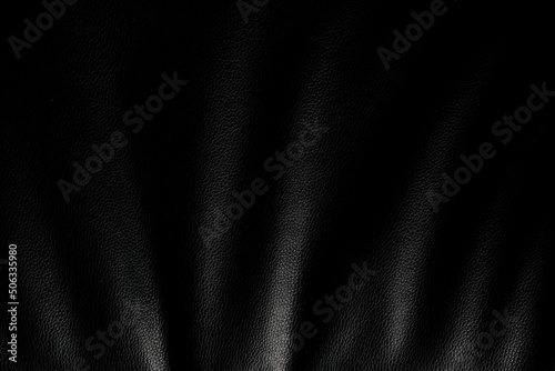 Abstract Wrinkled Black Leather Background With Light Effect.