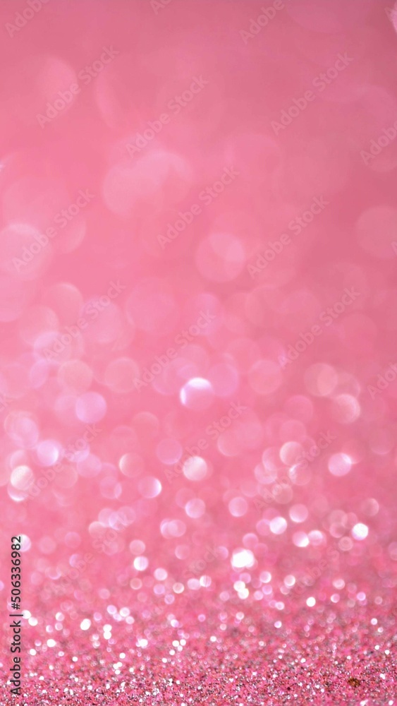 Pink glitter festive defocused lights background. Brilliant background for Ramadan and Eid holiday. A beautiful magic bokeh