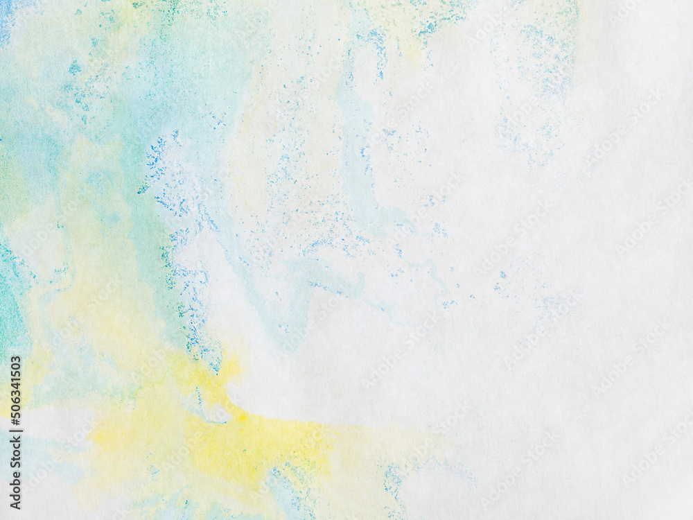 paper with blue green and yellow paint abstract