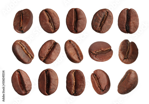 Set with aromatic roasted coffee beans on white background