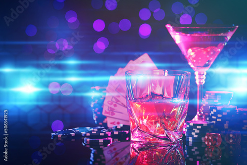 Canvas Print Alcohol drinks, dice, playing cards and casino chips on table against blurred lights