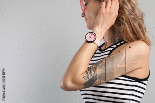 Woman before and after laser tattoo removal procedures on light background. Space for text photo