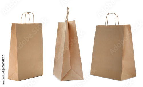 Set with kraft paper bags on white background