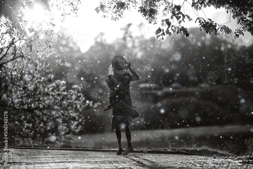 poplar fluff girl happiness / young adult girl in the urban landscape, happy cheerful model photo