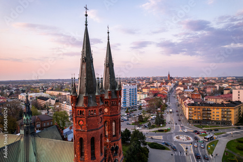 Holy Family Cathedral Church in Tarnow, Poland. Skyline of City Illuminated at Dusk. Cityscape and Architecture from Above.