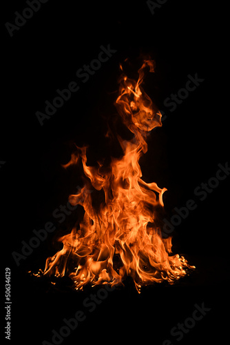 Fire flame burning and fire glowing on black background. © Volodymyr