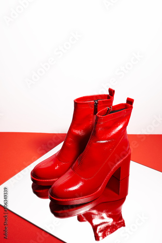 Red leather ankle boots.