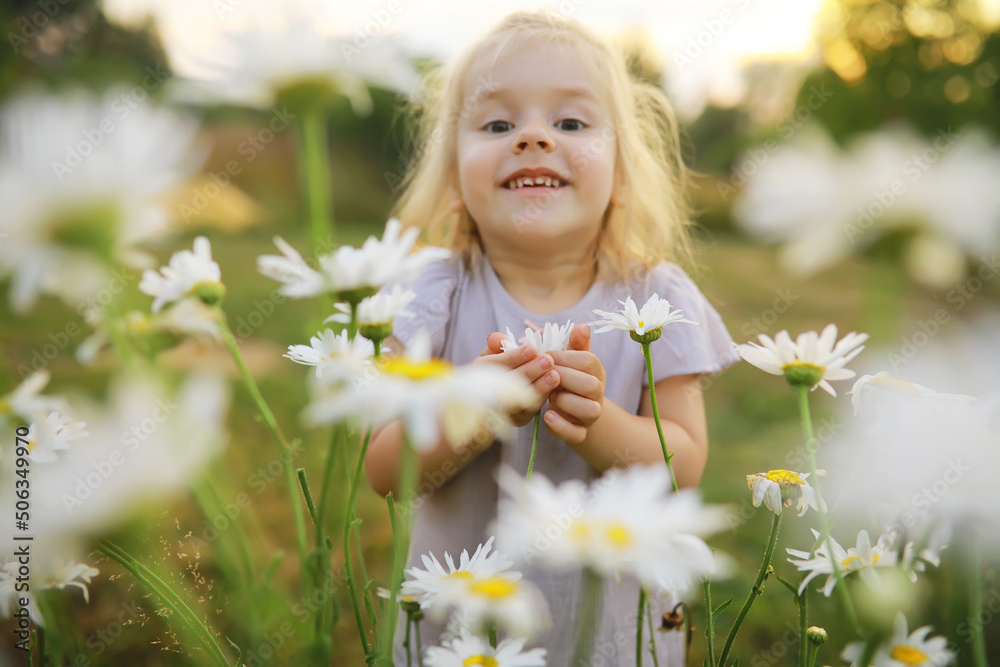 Children walk in the summer in nature. Child on a sunny spring morning in the park. Traveling with children. Children walk in the summer in nature. Child on a sunny spring morning in the park. Traveling with children.