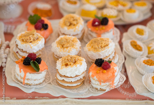 Candy bar with berry cakes, close-up