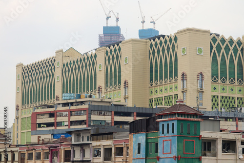selective focus of tanah abang market building jakarta. Tanahbang is the largest textile market in southeast Asia photo
