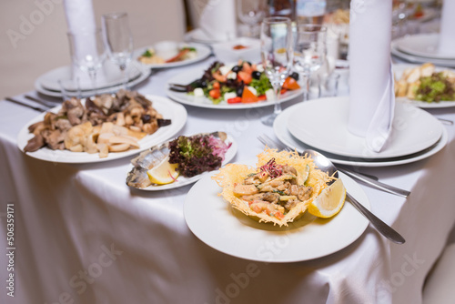 salads on a plate on a banquet table in a restaurant, close-up
