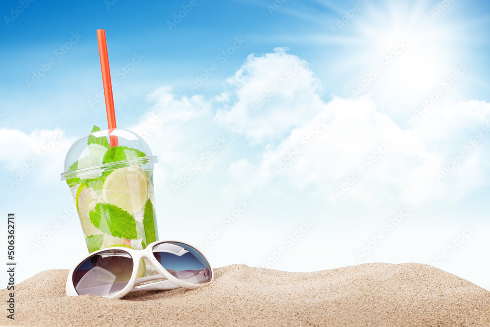 Fresh cold mojito cocktail on tropical beach Fresh cold mojito cocktail on tropical beach