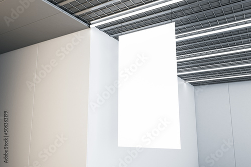 Close up of blank white stopper hanging in concrete interior with industrial ceiling. Mock up, 3D Rendering.