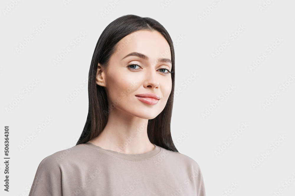 Beautiful young woman studio portrait, Pretty student girl isolated on white background, Beauty and skin care concept Beautiful young woman studio portrait, Pretty student girl isolated on white background, Beauty and skin care concept