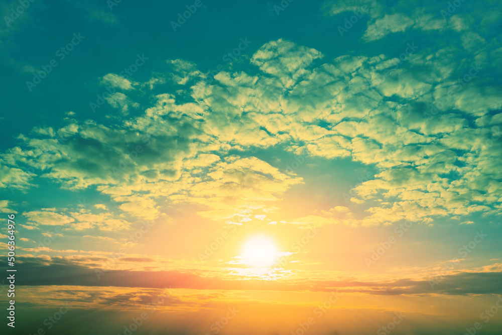 Colorful cloudy sky at sunset. Green-yellow gradient color