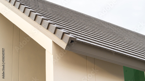 Eaves close-up. Low angle shot, eaves of a modern house,  Modern style eaves corner, beautiful, luxurious. Modern house design concept.