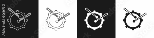 Set Drum with drum sticks icon isolated on black and white background. Music sign. Musical instrument symbol. Vector