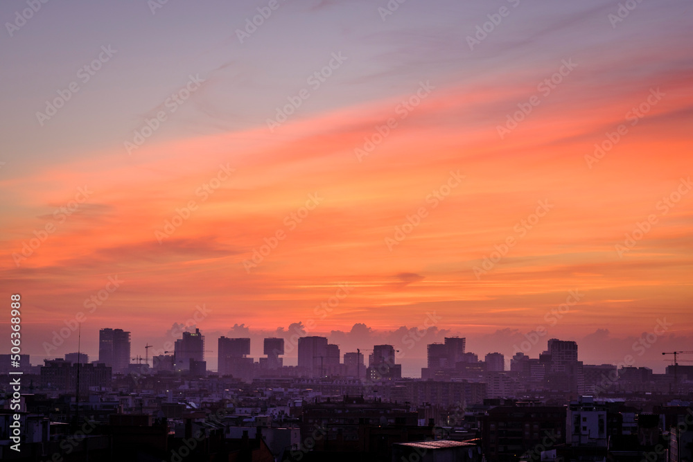 View of the city of Barcelona (Spain) in an autumn sunrise.