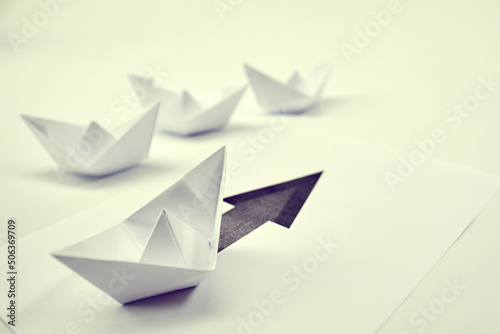 paper boats on the documents