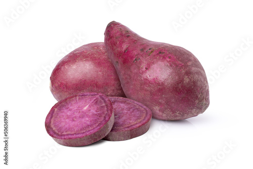 Purple sweet potatoes with slices isolated on white background.