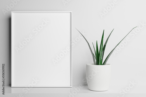 Foto Empty Photo Frame Mockup With White Vase